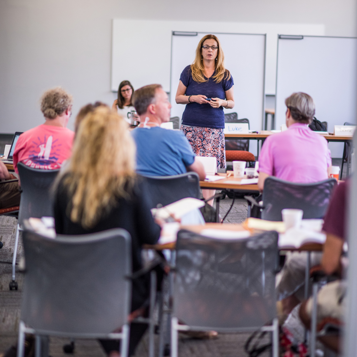 People sitting at desks at a Choices workshop